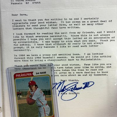 Sale Photo Thumbnail #92: Typed and hand-signed letter from Mike Schmidt dated May 15, 1986, accompanied by a vintage Mike Schmidt Philadelphia Phillies baseball card in a protective sleeve.