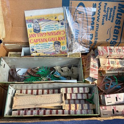 Sale Photo Thumbnail #14: Vintage Marx Captain Gallant of the Foreign Legion playset components, including original box lid, building structures, plastic figures, and accessories, circa 1950s.