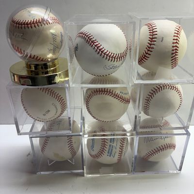 Sale Photo Thumbnail #98: Collection of nine signed and official baseballs, individually housed in clear acrylic display cases.