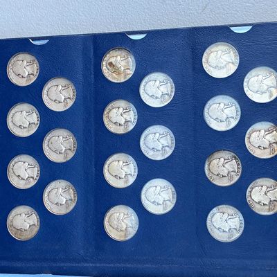 Sale Photo Thumbnail #74: Whitman coin folder filled with silver Washington quarters ranging from the late 1930s to early 1940s.