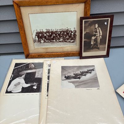 Sale Photo Thumbnail #108: Collection of vintage black-and-white photographs, including two framed portraits depicting military personnel and matted prints showing vintage airplanes and a woman.
