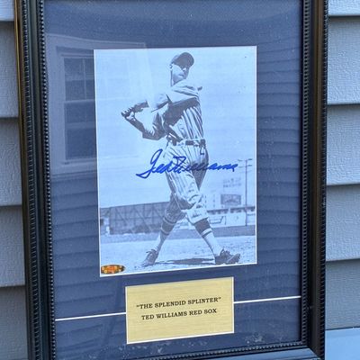 Sale Photo Thumbnail #63: Framed autographed black-and-white photograph of Boston Red Sox legend Ted Williams, featuring a plaque reading 'The Splendid Splinter Ted Williams Red Sox'.