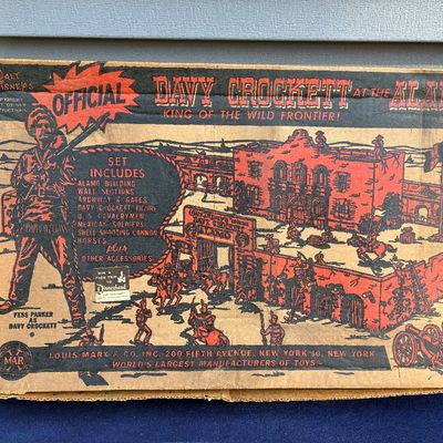 Sale Photo Thumbnail #12: Vintage 1950s Marx Walt Disney's Official Davy Crockett at the Alamo play set in original illustrated cardboard box, showing edge wear and creasing.