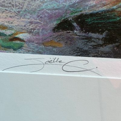 Sale Photo Thumbnail #82: Pencil-signed artist signature reading 'Joëlle' on the bottom border of a matted art print.