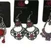 Collection of five pairs of Paparazzi brand costume dangle earrings, featuring various colorful stones and ornate silvertone settings.