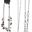 Set of three Paparazzi brand fashion necklaces on original carding, featuring silver-tone chains with beaded and ring link accents.