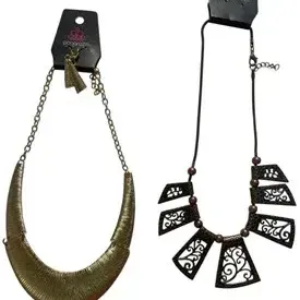 Two Paparazzi brand costume necklaces, including a textured brass-tone crescent collar necklace and a brown cut-out filigree bib necklace.