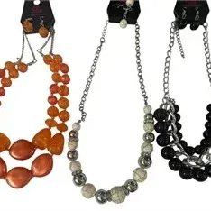 Set of three Paparazzi brand statement necklaces with matching earrings, including orange, faux-turquoise, and black beaded designs.
