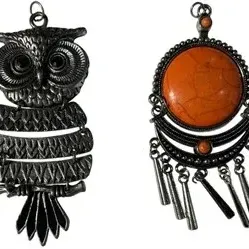 Pair of vintage boho pendant necklaces, featuring an articulated silvertone owl and a Southwestern-style pendant with a faux orange stone...