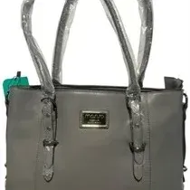 Grey faux leather tote bag by Mario Valentino, featuring double shoulder straps with original protective plastic wrapping.
