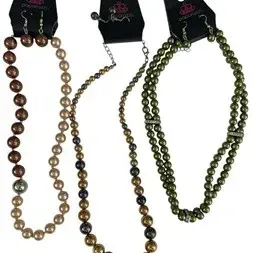 Trio of Paparazzi beaded faux-pearl costume necklaces with matching dangle earrings on original retail display cards.