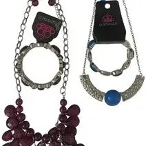 Two Paparazzi brand costume jewelry sets, including a purple beaded cluster necklace with matching earrings and bracelet, alongside a...
