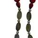 Beaded fashion necklace featuring red and iridescent oval beads, a circular pendant drop, and a lobster claw clasp with extension chain.
