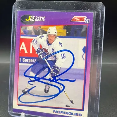Sale Photo Thumbnail #74: 1991 Score Joe Sakic #25 Quebec Nordiques Hockey Card Blue Ink Autograph
