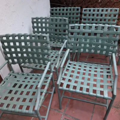 Sale Photo Thumbnail #13: Set of five vintage green vinyl woven strap patio chairs with metal frames, showing light wear.