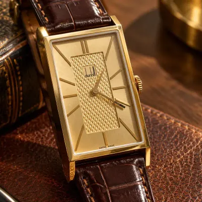 Alfred Dunhill Swiss-Made 18K Gold Rectangular Quartz Wristwatch – Brown Leather Strap
