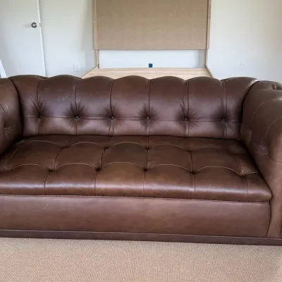 Brown Leather Tufted Chesterfield-Style Sofa
