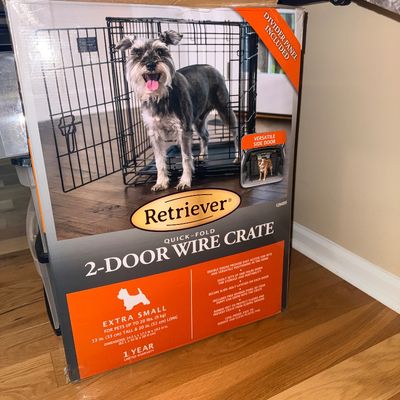 Retriever brand extra-small quick-fold 2-door wire crate in its original packaging.