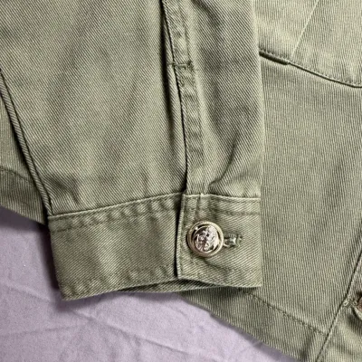 Zara denim jacket in olive green blends utility-inspired design