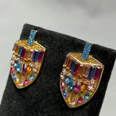 BaubleBar Hanukkah Dreidel holiday stud earrings