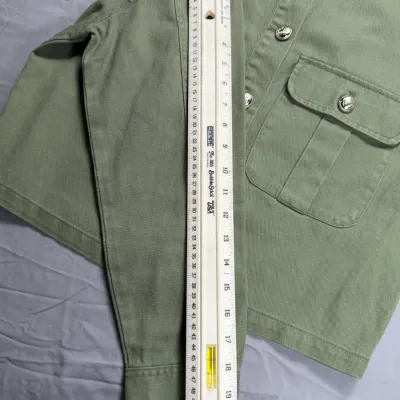 Zara denim jacket in olive green blends utility-inspired design
