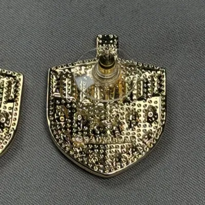 BaubleBar Hanukkah Dreidel holiday stud earrings