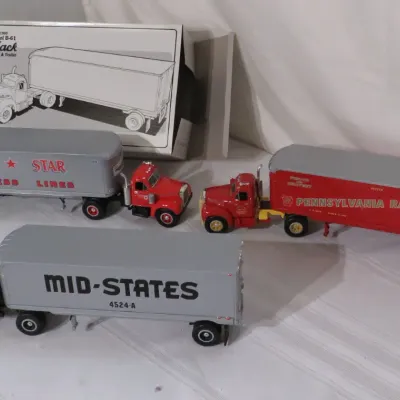 Three vintage 1960 Model B-61 Mack tractor and trailer die-cast scale models with original box, featuring Red Star Express Lines,...