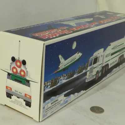 Vintage 1999 Hess Toy Truck and Space Shuttle in original packaging box.