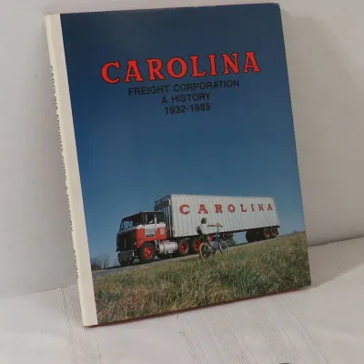 Carolina Freight Corporation: A History 1932-1985 paperback book, featuring a semi-truck photograph on the cover.