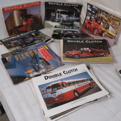 Collection of vintage truck enthusiast magazines, including multiple issues of Double Clutch and Trucks magazine, dating from the 1970s...