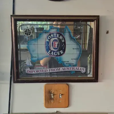 Sale Photo Thumbnail #109: Collection of three vintage framed beer advertising bar mirrors featuring George Killian's Irish Red, Foster's Lager, and Sapporo Beer.