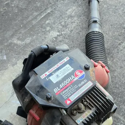 Sale Photo Thumbnail #66: Maruyama BL4600HA gas-powered backpack leaf blower with attached flexible hose and nozzle.