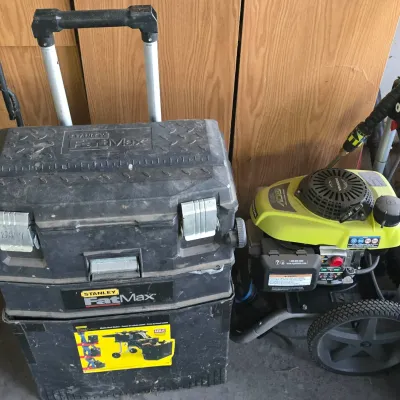 Sale Photo Thumbnail #11: Stanley FatMax rolling mobile work station chest next to a Ryobi pressure washer powered by a Honda GCV160 engine.