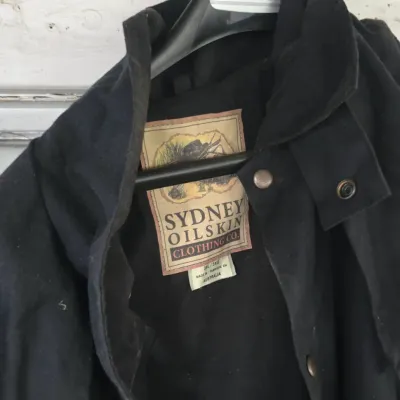 Sale Photo Thumbnail #30: Black Sydney Oilskin Clothing Co. outerwear jacket, size 3XL, made in Australia.
