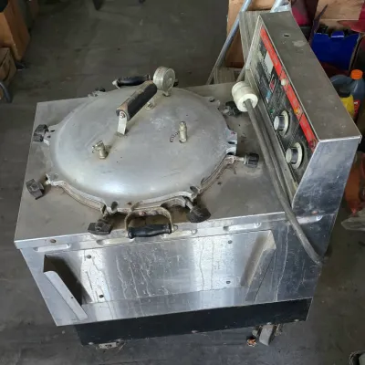 Sale Photo Thumbnail #12: Vintage Smokaroma commercial pressure smoker and cooker with stainless steel housing and analog control panel.