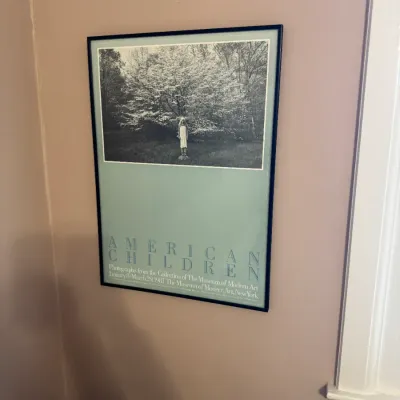 Framed 1981 exhibition poster for "American Children" at The Museum of Modern Art, New York, featuring a black-and-white...