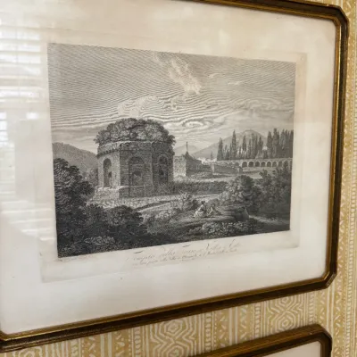 Framed antique architectural engraving depicting Italian ruins, housed in a thin gilt frame with a white mat.