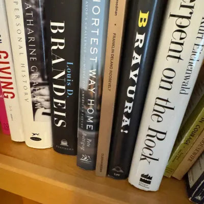 Collection of assorted hardcover history and biography books, including titles by Pete Buttigieg and Kurt Eichenwald, arranged on a...