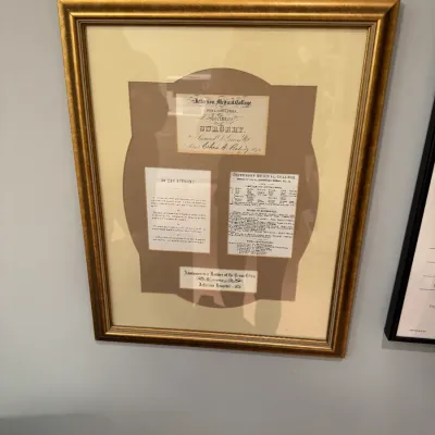 Framed 1872 Jefferson Medical College historical document collection, housed in a molded gilt wooden frame with custom matting.