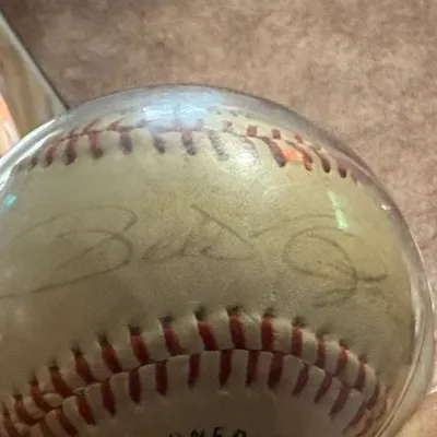 Sale Photo Thumbnail #433: Autographed vintage baseball housed inside a clear plastic protective display cube.