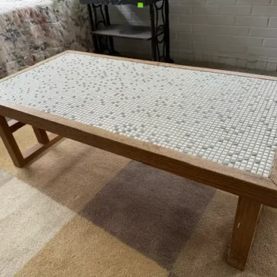Sale Photo Thumbnail #177: Mid-century modern mosaic tile-top coffee table with a light oak wooden frame and rectangular legs.