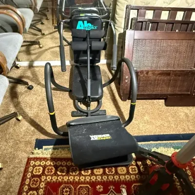 Sale Photo Thumbnail #348: Weider Ab Shaper and Ab Works exercise equipment paired with surrounding household furniture.