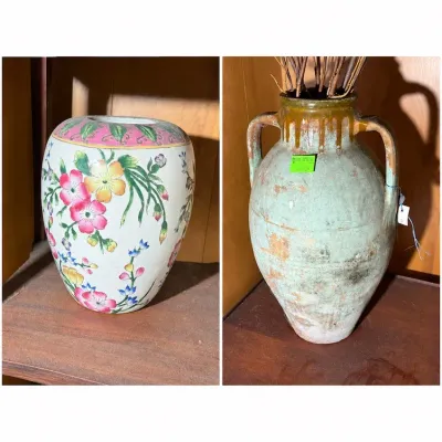 Sale Photo Thumbnail #250: Side-by-side view of a floral Chinese Famille Rose porcelain ginger jar and a large rustic, weathered terracotta amphora jug with double handles.