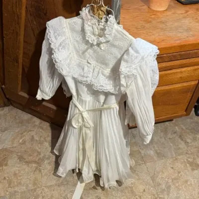 Sale Photo Thumbnail #364: Vintage white lace and pleated chiffon girl's special occasion dress, featuring a high collar ruffle overlay and satin waist tie.