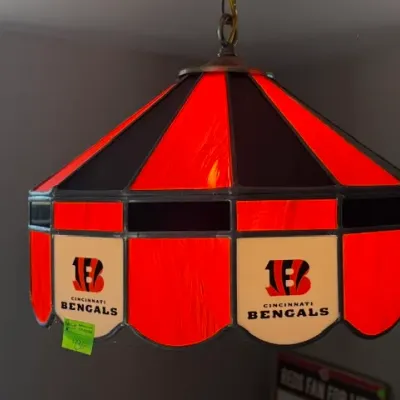 Sale Photo Thumbnail #439: Cincinnati Bengals stained glass style hanging Tiffany light fixture in orange and black.