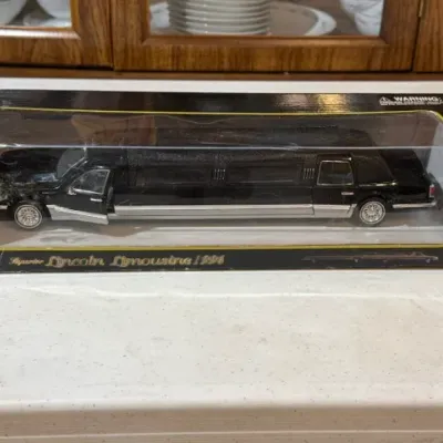 Sale Photo Thumbnail #99: Superior 1:24 scale die-cast Lincoln Limousine in original window box packaging.