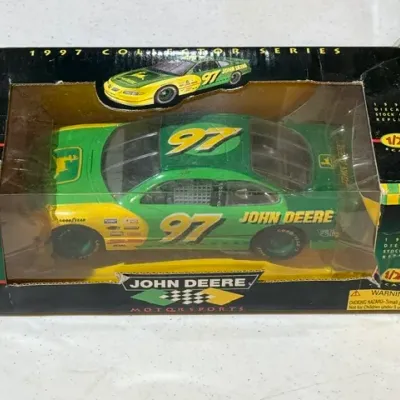 Sale Photo Thumbnail #95: 1997 Collector Series John Deere #97 diecast stock car replica in original 1:24 scale box.