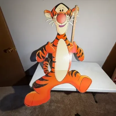 Sale Photo Thumbnail #407: Disney Winnie the Pooh Tigger cardboard standee figure, shown next to a yardstick for scale.
