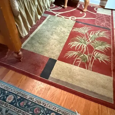 Sale Photo Thumbnail #148: Contemporary area rug featuring a tropical palm motif set against red, green, and beige color-blocked panels.