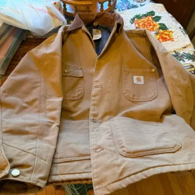 Sale Photo Thumbnail #500: Vintage Carhartt tan duck canvas blanket-lined chore coat with corduroy collar.